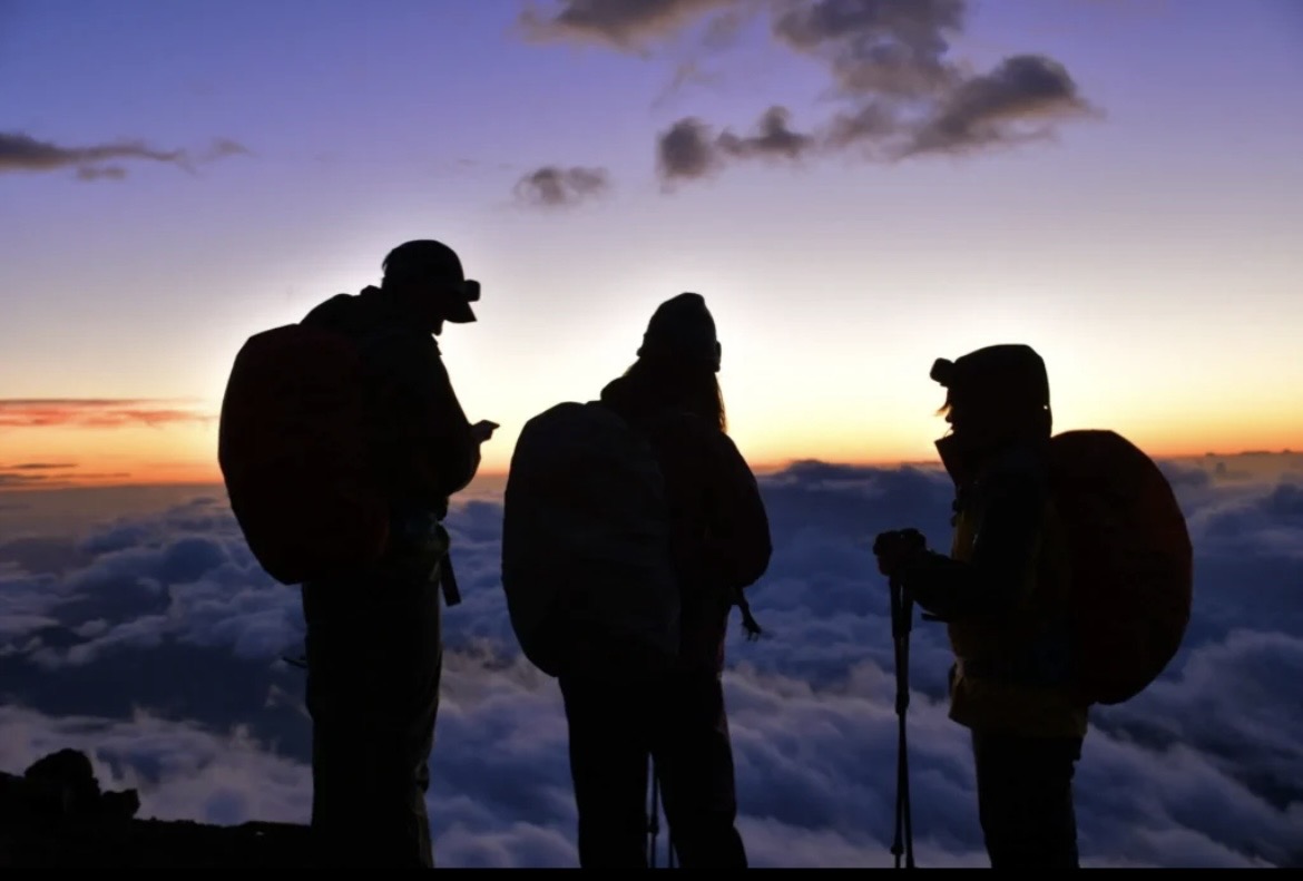 A climber ascending Mount Fuji